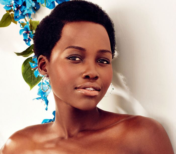 Lupita Nyong'o with blue flowers