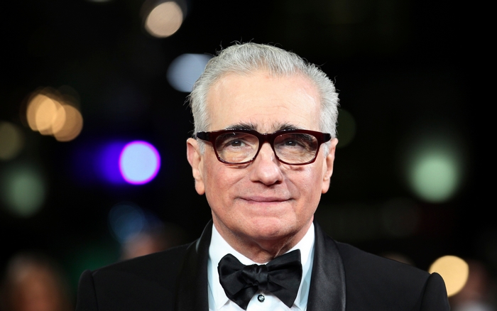Martin Scorsese wearing glasses and a tuxedo