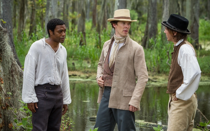 Chiwetel Ejiofor, Benedict Cumberbatch, and Paul Dano in a swamp
