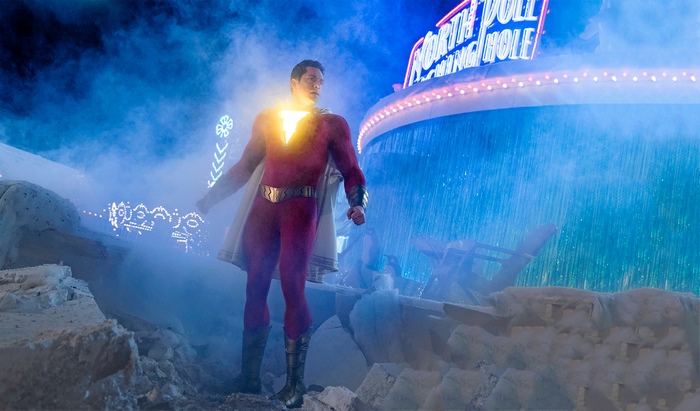 Shazam from DC Comics standing in a snowy amusement park
