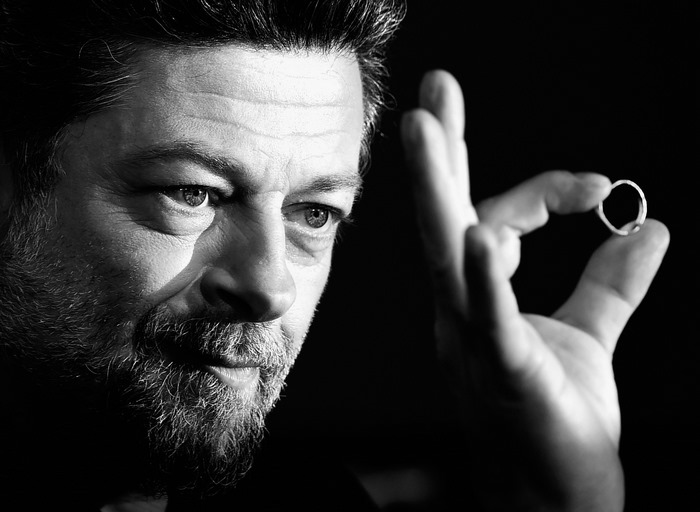 Andy Serkis holding a ring