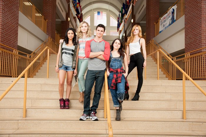 Group of young adults on school stairs