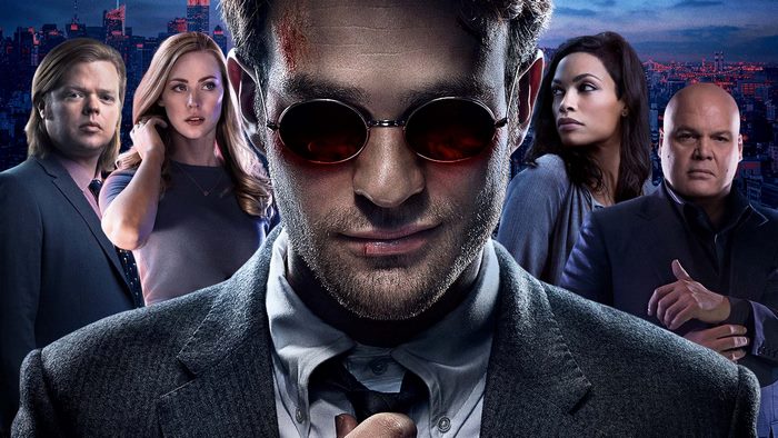 Daredevil characters in front of a city skyline