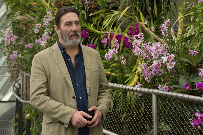 Ciarán Hinds in a botanical garden