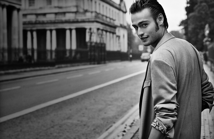 Douglas Booth on a City Street