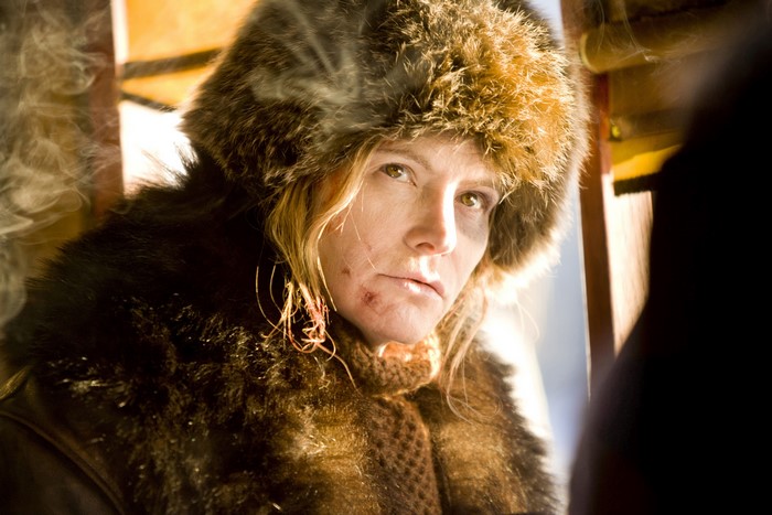 Jennifer Jason Leigh in fur hat and coat