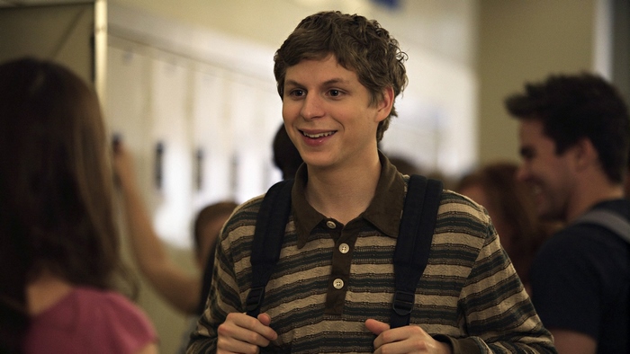 Michael Cera in a school hallway