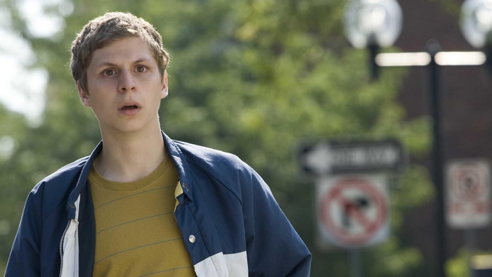 Michael Cera in a blue and white jacket