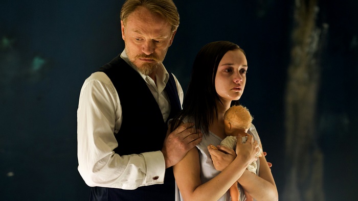 Olivia Cooke with a doll