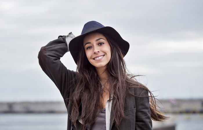 Oona Chaplin wearing a hat