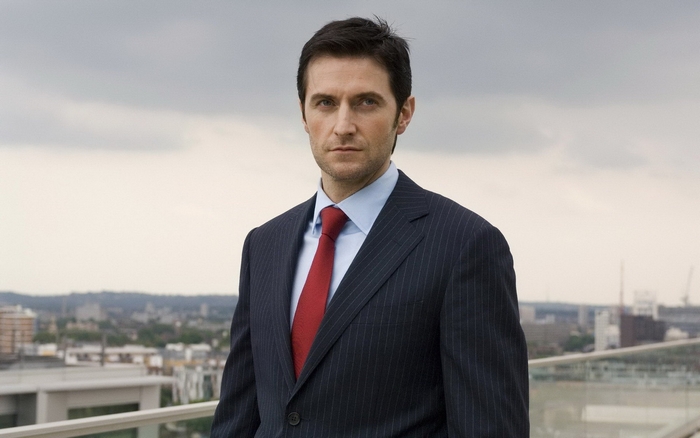 Richard Armitage in a suit