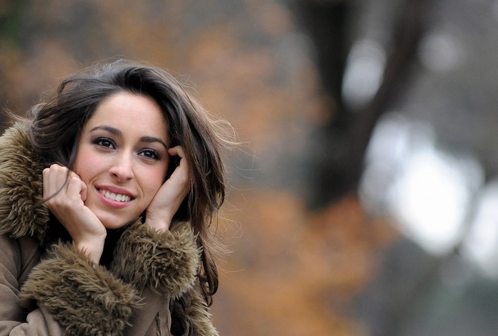 Oona Chaplin in a fur-lined coat