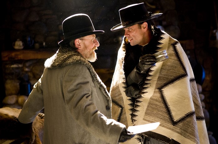 Walton Goggins and man in hats