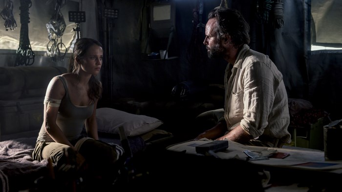 Walton Goggins in a dimly lit room