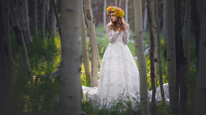 Bride with flower crown in a forest