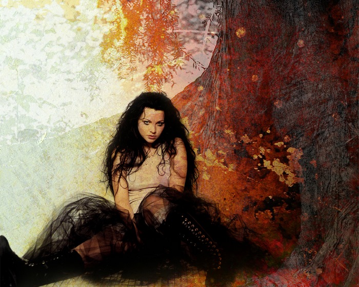 Amy Lee sitting by a tree