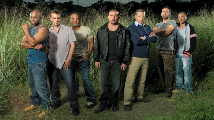 Prison Break cast standing in tall grass