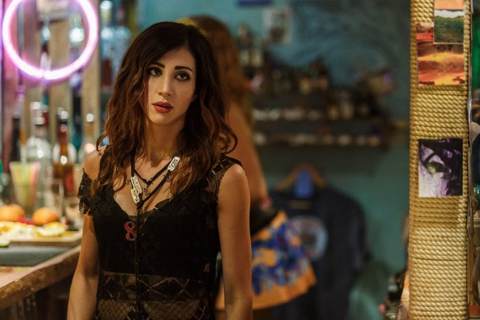 Dana DeLorenzo in a black lace top