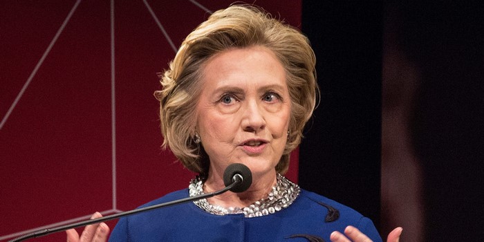Hillary Clinton speaking at a podium