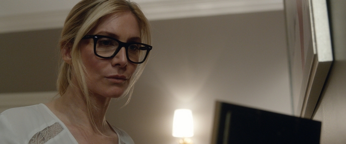 Elizabeth Mitchell wearing glasses