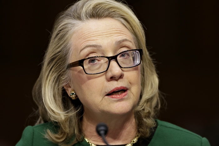 Hillary Clinton speaking at a podium