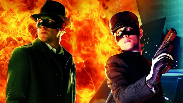 The Green Hornet and Kato in front of fire