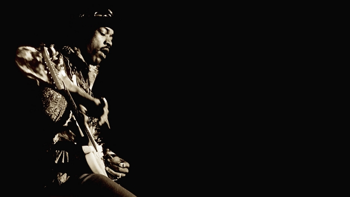 Jimi Hendrix playing guitar
