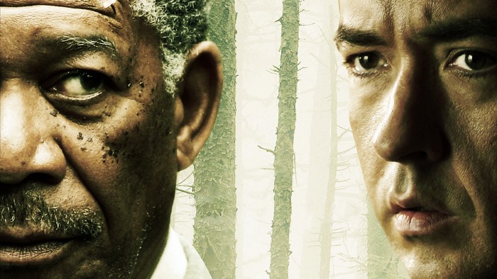 John Cusack and Morgan Freeman in a forest