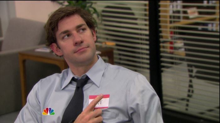 Jim Halpert from The Office pointing at name tag