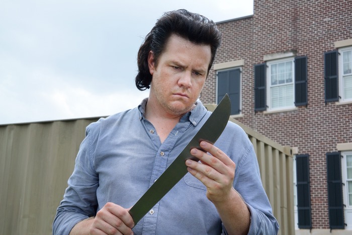Eugene Porter from The Walking Dead holding a machete