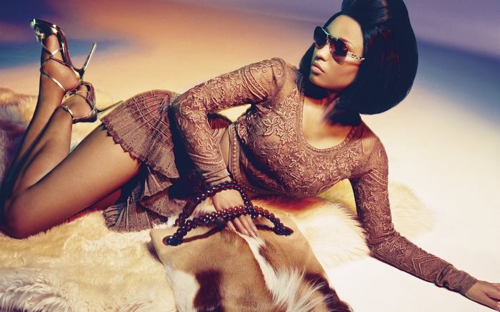 Nicki Minaj posing with handbag and heels