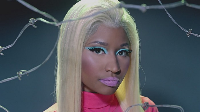 Nicki Minaj behind barbed wire