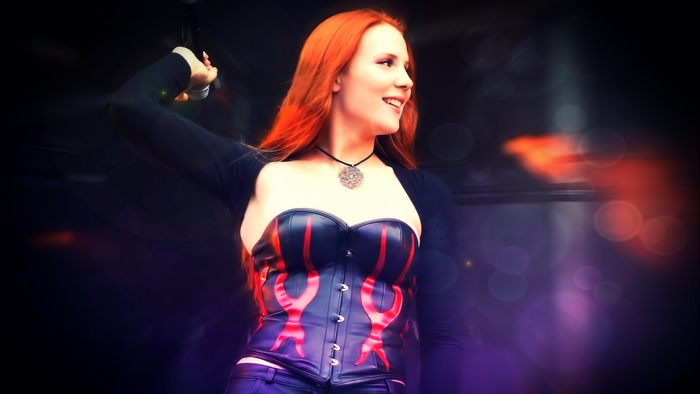 Simone Simons performing on stage