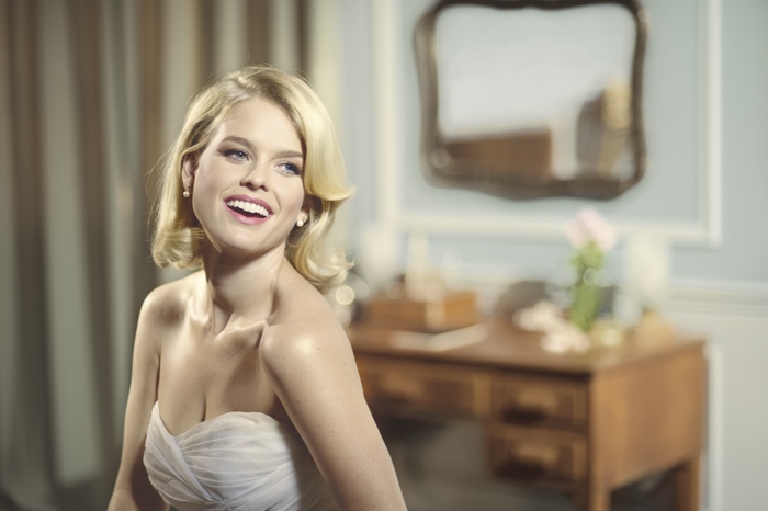Alice Eve in a white dress