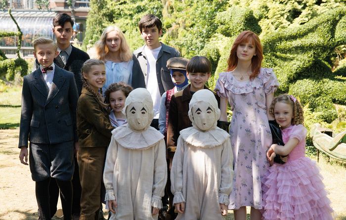 Children in costume in a garden