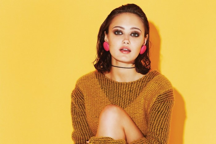 Ella Purnell in yellow sweater