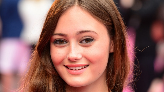 Ella Purnell Smiling with Long Brown Hair