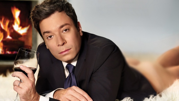 Jimmy Fallon with Wine by Fireplace