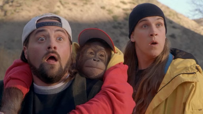 Kevin Smith and Jason Mewes with an orangutan