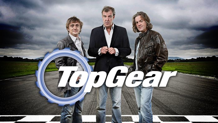 Top Gear hosts on a racetrack