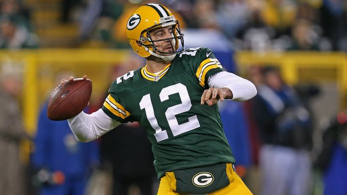 Aaron Rodgers throwing a football