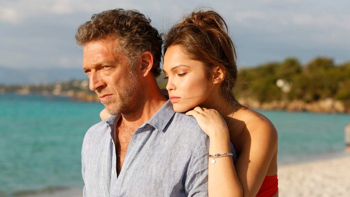 Vincent Cassel and Woman on Beach