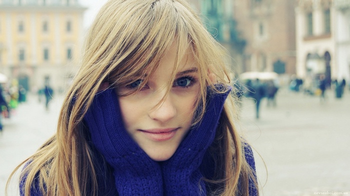 Young woman with blonde hair and blue eyes