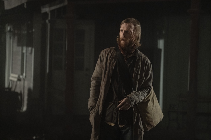 Austin Amelio in a dark setting