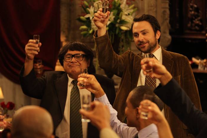 Danny DeVito and Charlie Day toasting