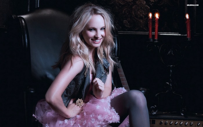 Candice King in a pink tutu and leather vest