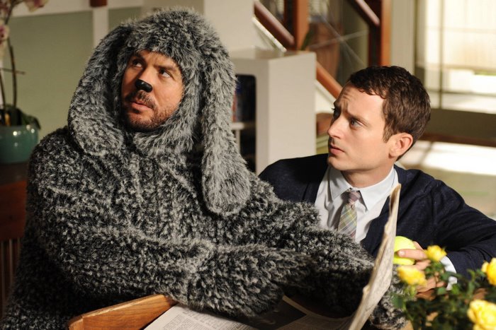 Jason Gann in a dog costume with Elijah Wood