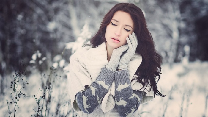 Woman in winter clothing with gloves