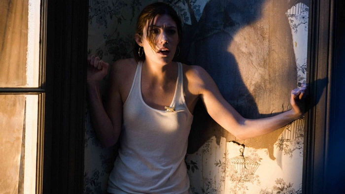 Jennifer Carpenter in a dark room