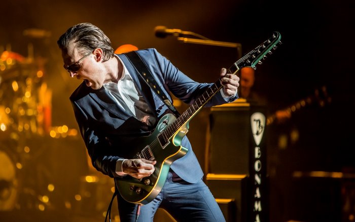 Joe Bonamassa playing guitar on stage